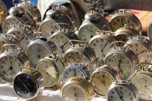 old alarm clocks in a market in italy