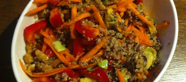 quinoa, avocado, carrot, capsicum salad with nuts and asian dressing